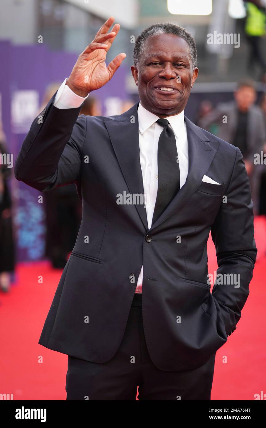 John Douglas Thompson poses for photographers upon arrival for the