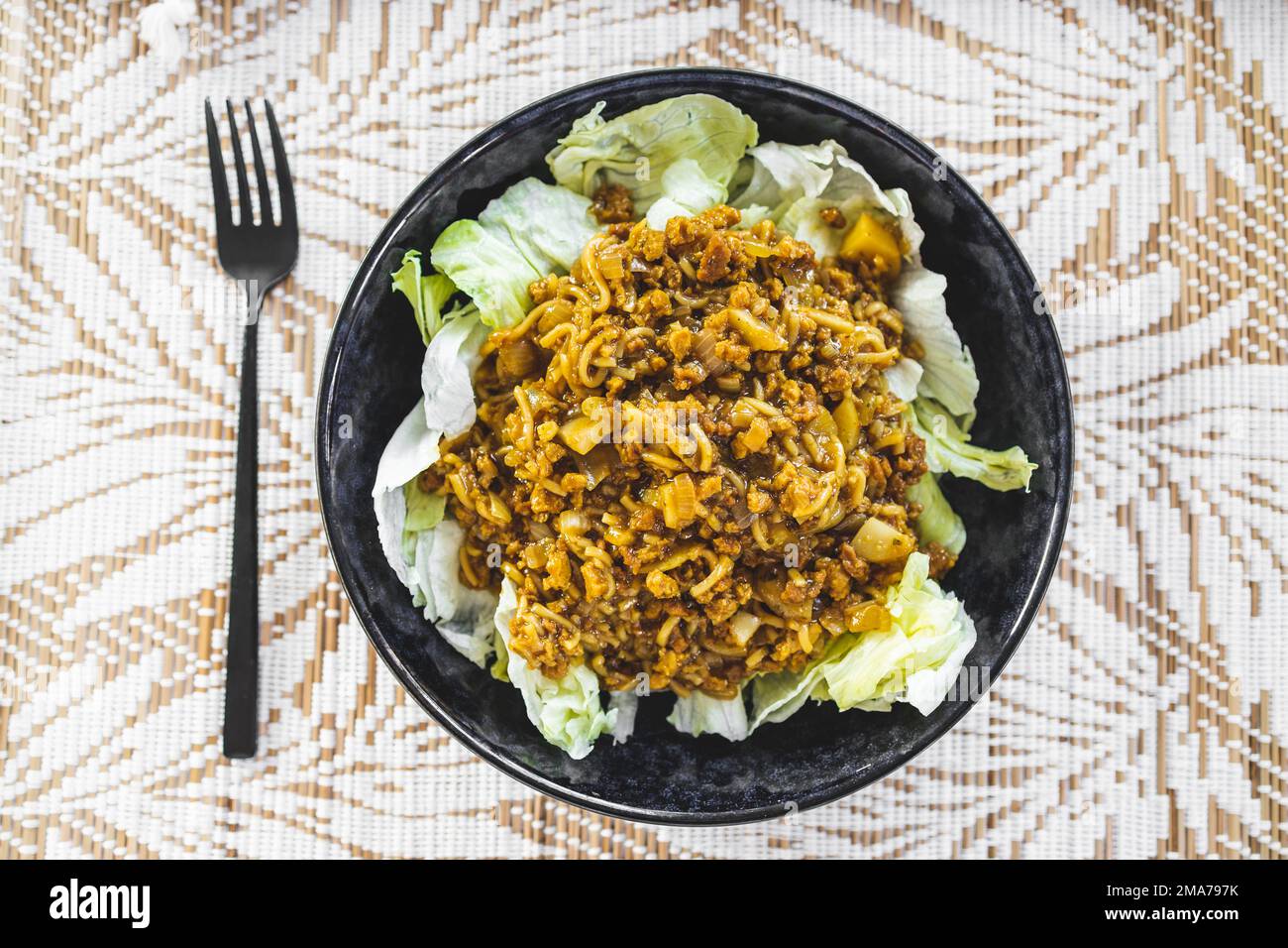plant-based san choy bau with soy mince and shredded lettuce, healthy vegan food recipes Stock Photo