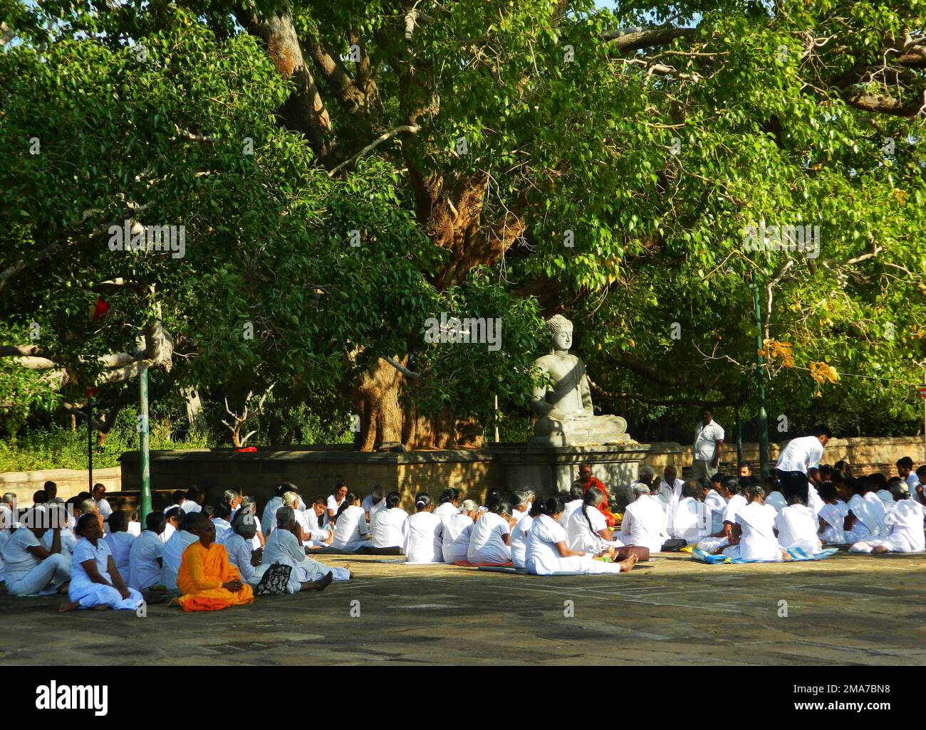 Pilgrimages observe sil at the Atmasthana. They gather together and worship the Abhayagiri stupa. The Bikkus give them sil. Sri Lanka. Stock Photo