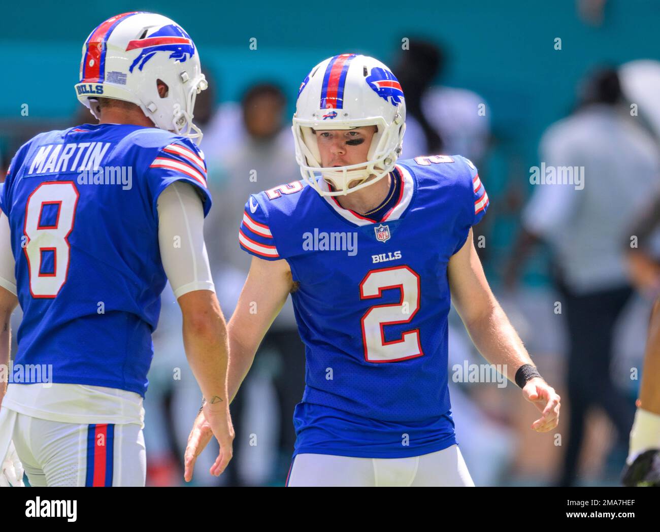 Buffalo Bills punter Sam Martin (8) celebrates with teammates their 32-29  win over the Miami Dolphins during first quarter of an NFL football game at  Highmark Stadium on Saturday, Dec. 17, 2022