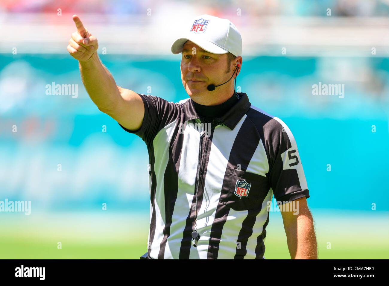 NFL referee Alex Kemp gestures during an NFL football game between the