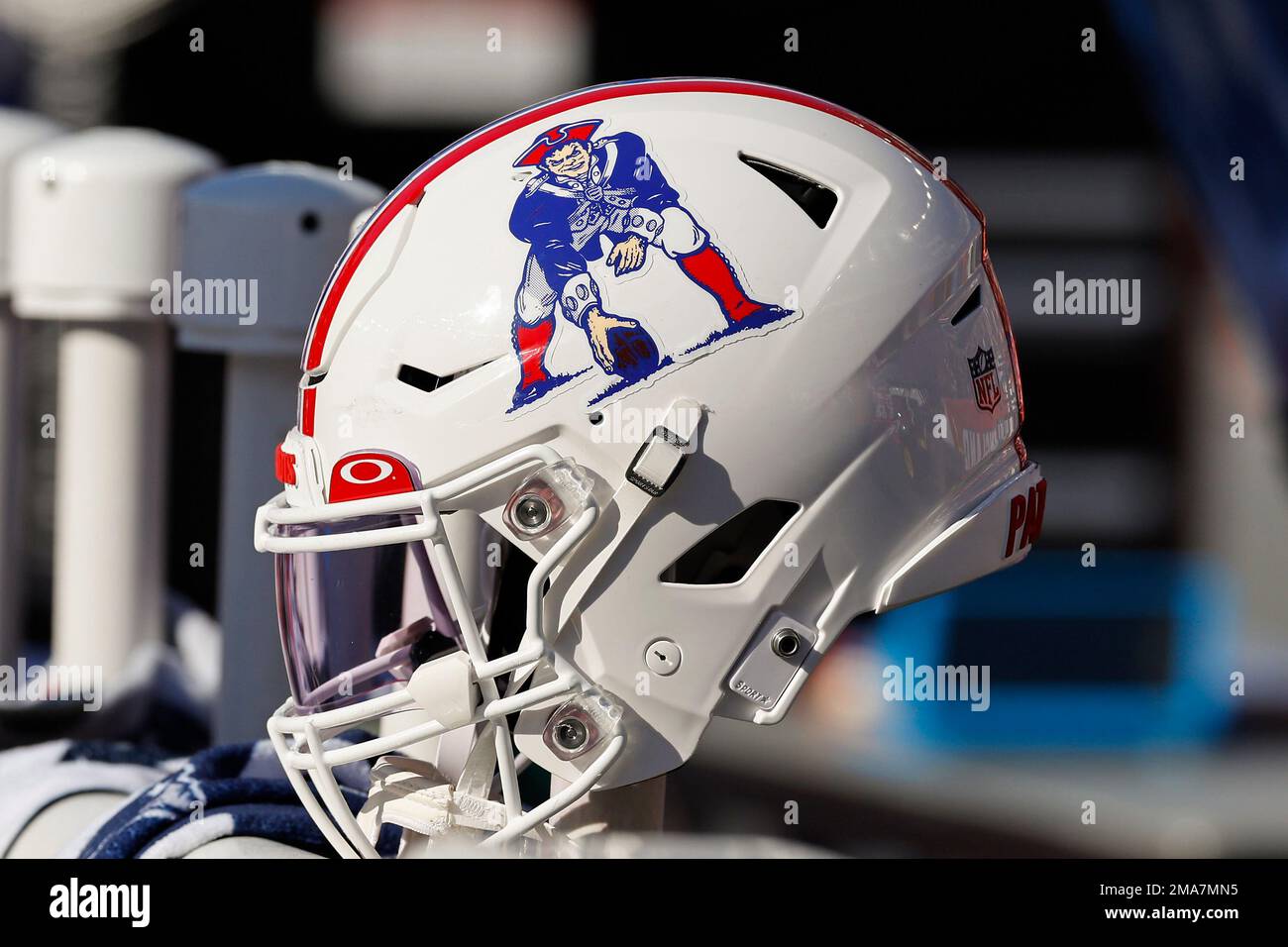 The throwback logo of the New England Patriots is seen on a helmet