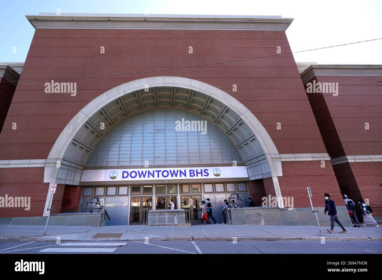 Students enter Downtown Burlington High School through a giant