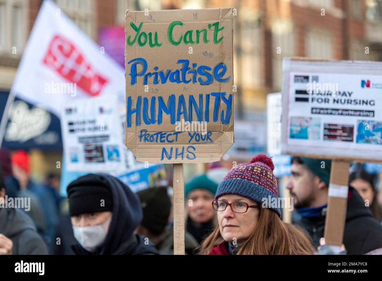 Protesters gathered outside the University College London calling for a pay rise for nurses and improvements in conditions. Privatisation placard Stock Photo