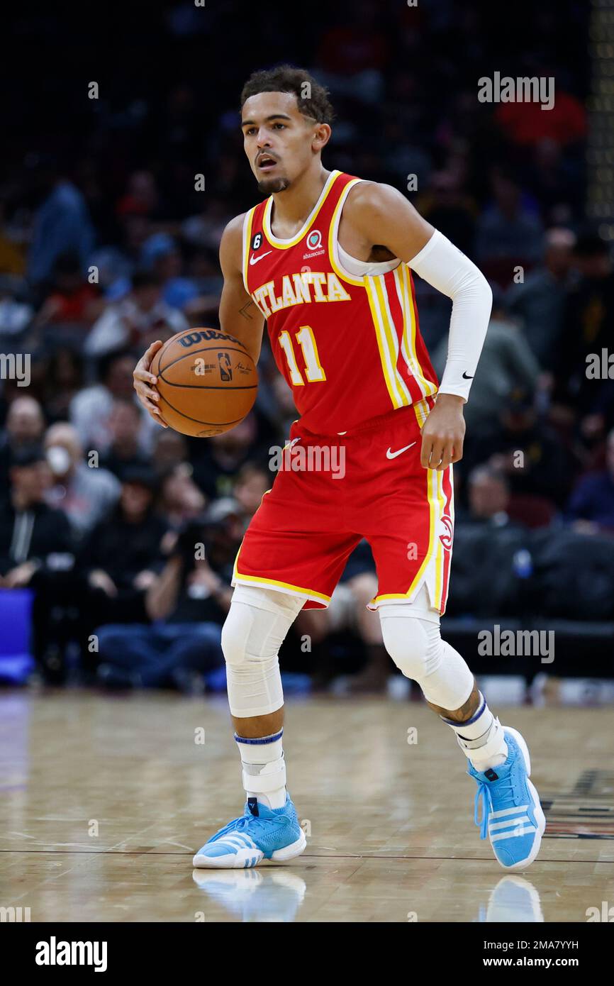 Atlanta Hawks guard Trae Young plays against the Cleveland Cavaliers during the second half of a preseason NBA basketball game, Wednesday, Oct. 12, 2022, in Cleveland. (AP Photo/Ron Schwane) Stock Photo