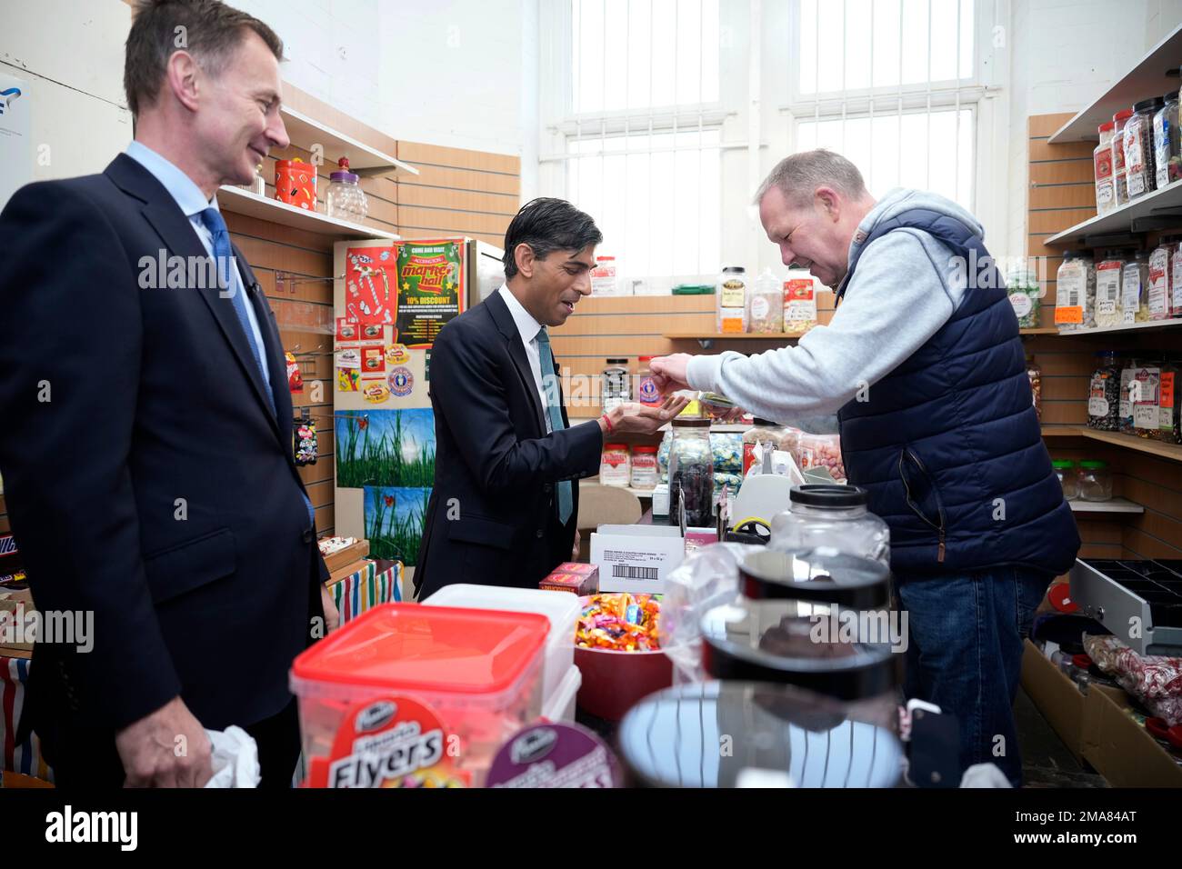 Prime Minister Rishi Sunak (centre) Purchases Sweets With Chancellor 