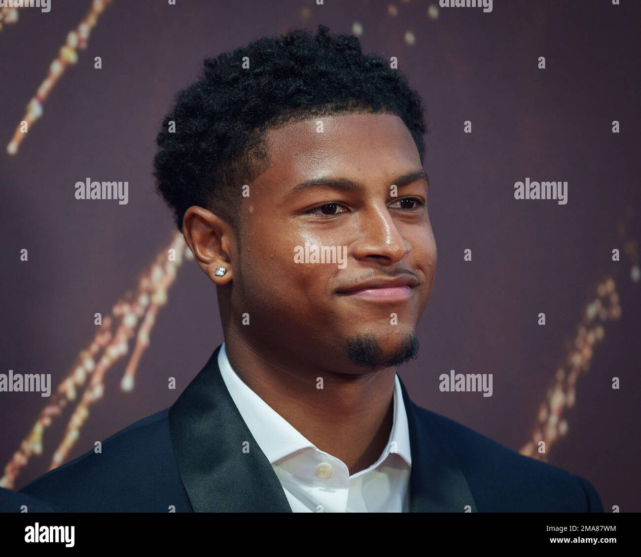Rhian Brewster poses for photographers upon arrival for the premiere of