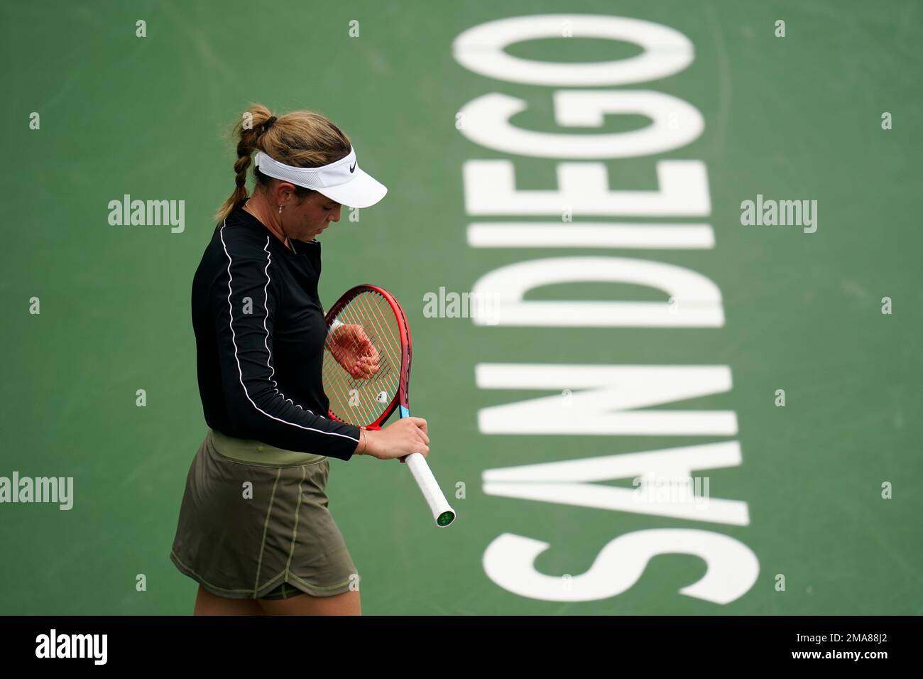 Donna Vekic of Croatia adjusts her racket as she plays Karolina ...