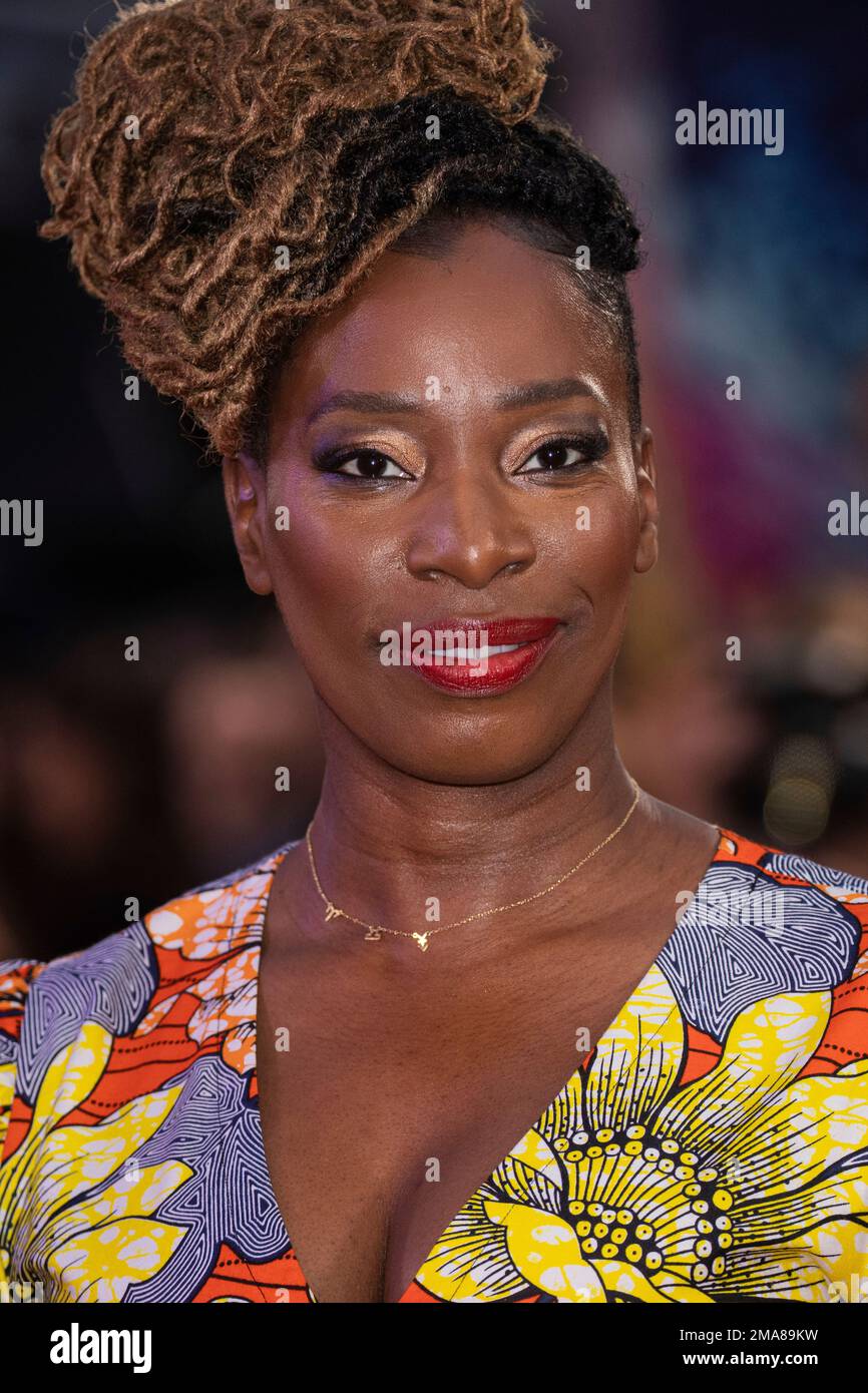 Tanya Moodie poses for photographers upon arrival for the premiere of