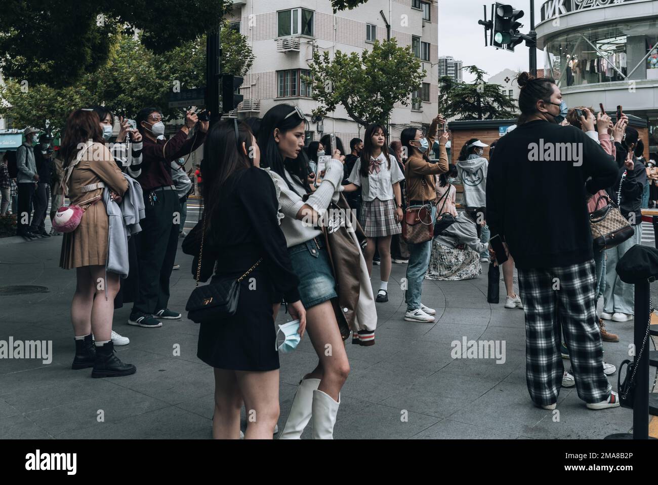 A group of tourists at the Wukang Mansions in Shanghai in China Stock Photo