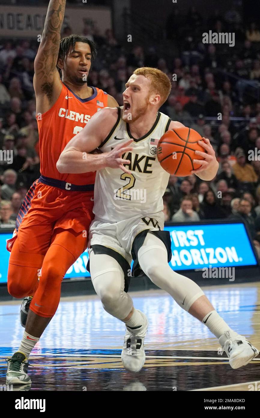 Wake Forest guard Cameron Hildreth (2) drives against Clemson guard Dillon Hunter during the