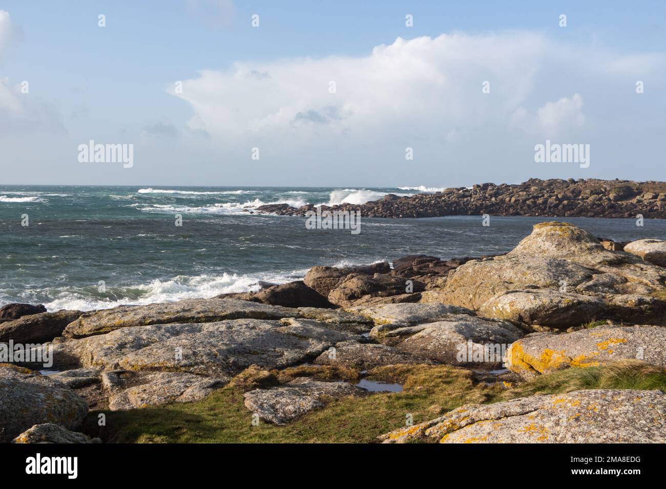 Coast in Brittany with waves crushing on rocks Stock Photo - Alamy