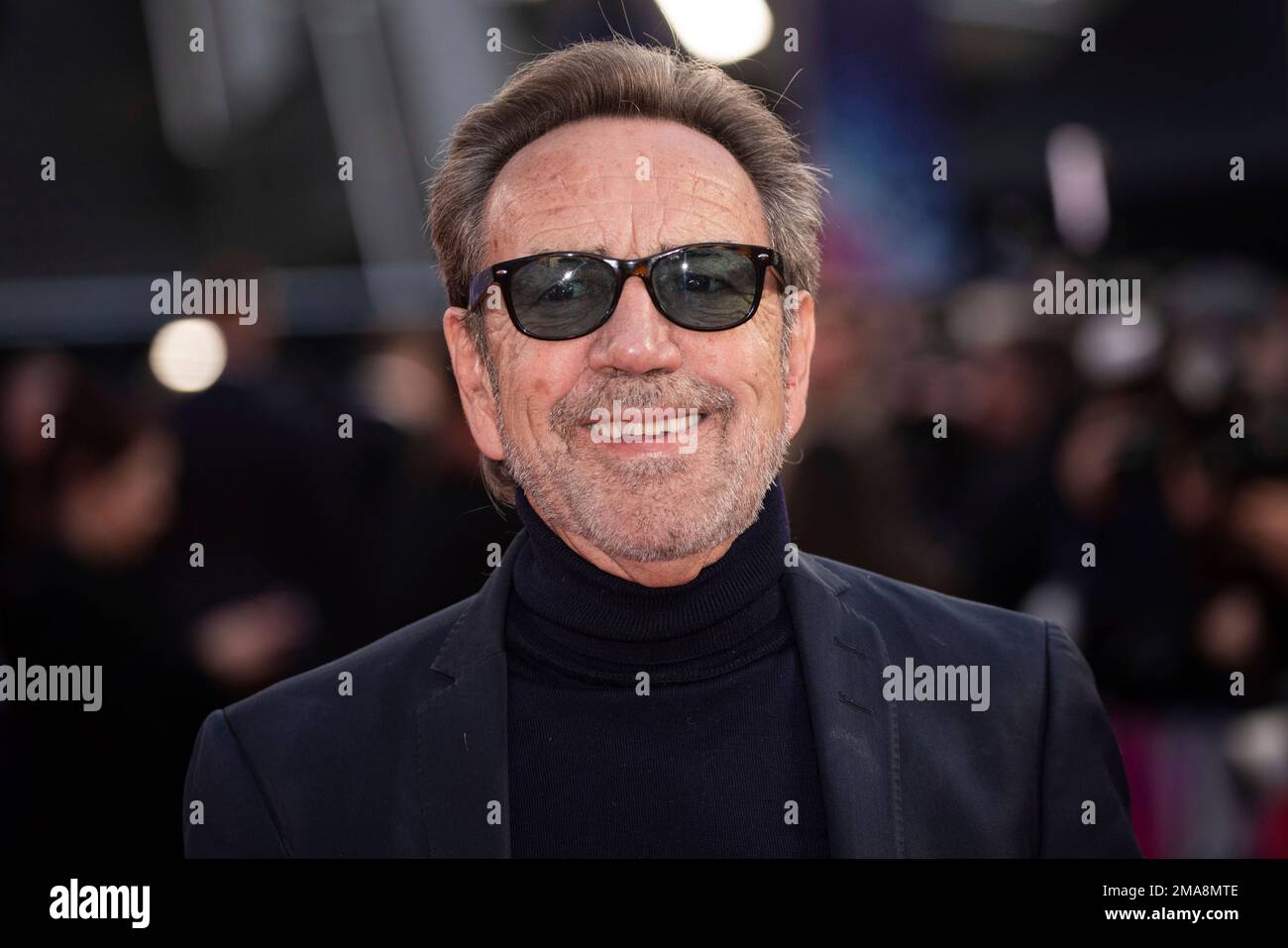 Robert Lindsay poses for photographers upon arrival for the premiere of