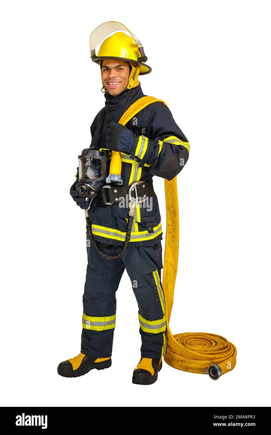 Fireman holds fire hose and looking at camera Stock Photo