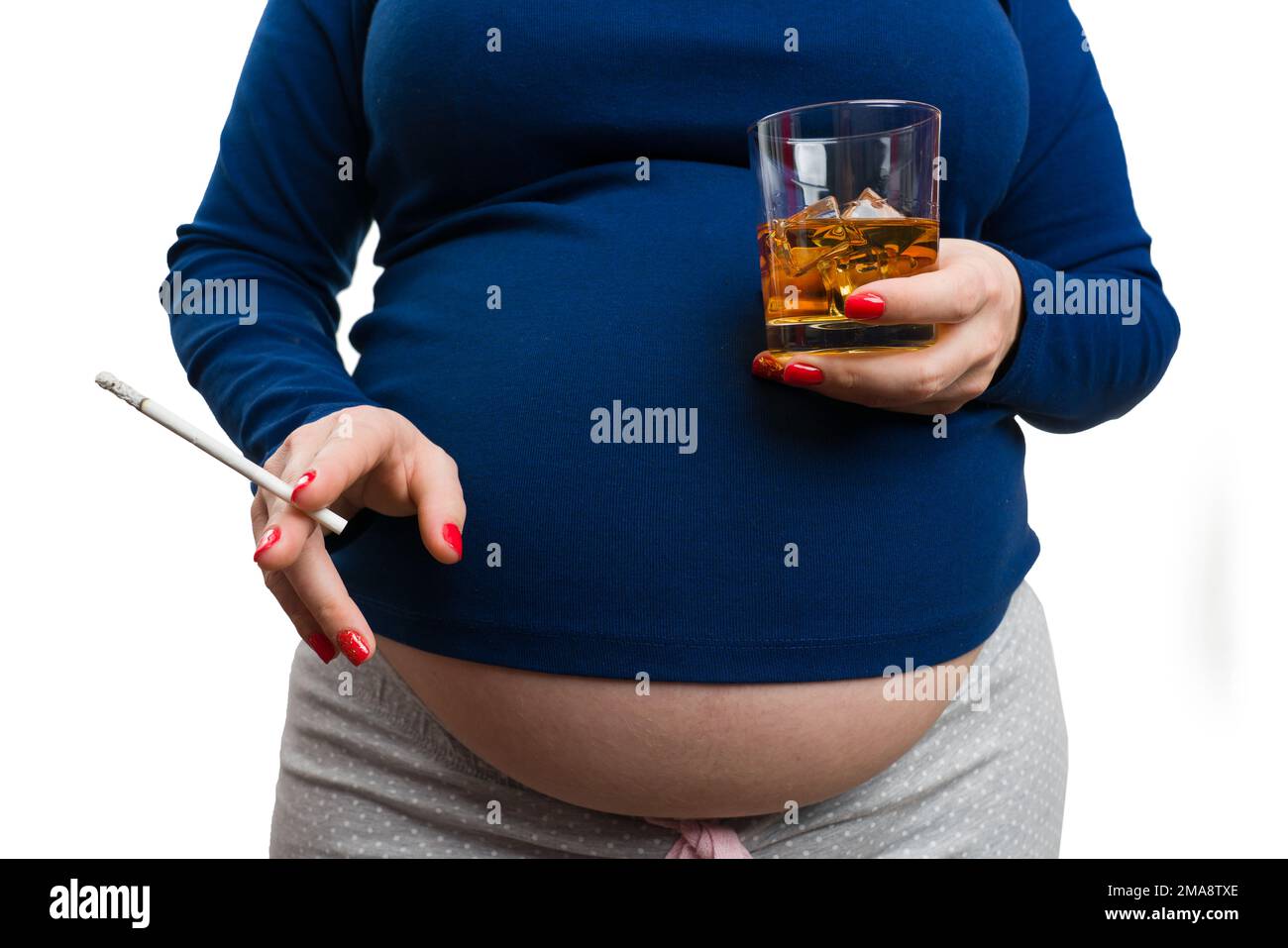 Closeup of pregnant woman holding cigarette and whiskey isolated on white background as