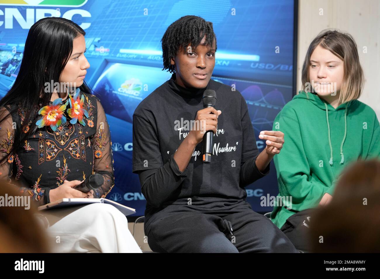 climate-activist-vanessa-nakate-of-uganda-speaks-beside-greta-thunberg-of-sweden-right-and-helena-gualinga-of-ecuador-left-at-a-press-conference-at-the-world-economic-forum-in-davos-switzerland-thursday-jan-19-2023-the-annual-meeting-of-the-world-economic-forum-is-taking-place-in-davos-from-jan-16-until-jan-20-2023-ap-photomarkus-schreiber-2MA8WMY.jpg