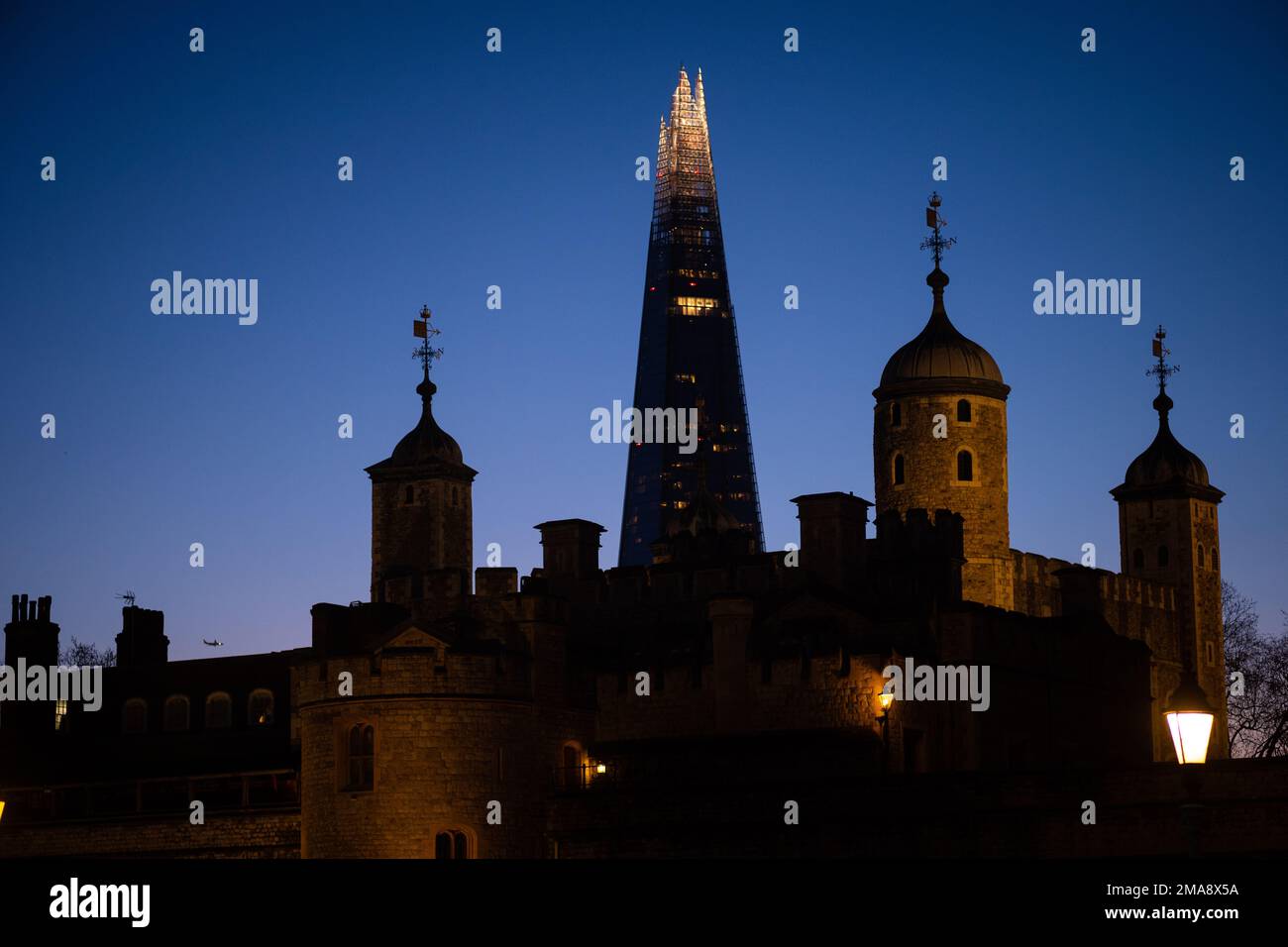 The Shard towers over the Tower of London. New and old in London, UK Stock Photo