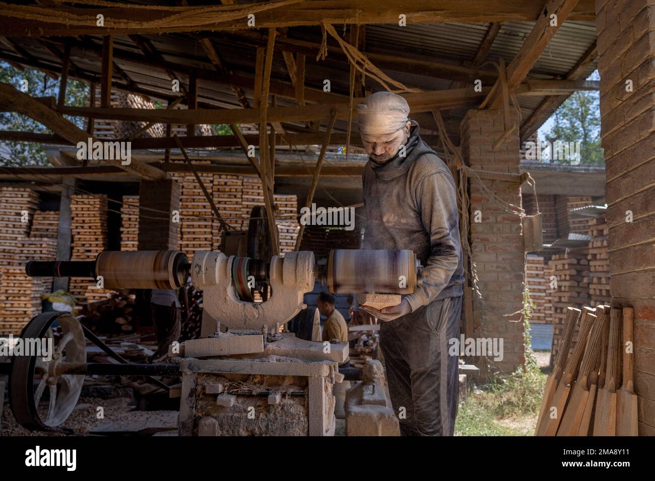 Ali Raza Factory Ali Raza, a worker from the Indian state of Uttar Pradesh levels the ...