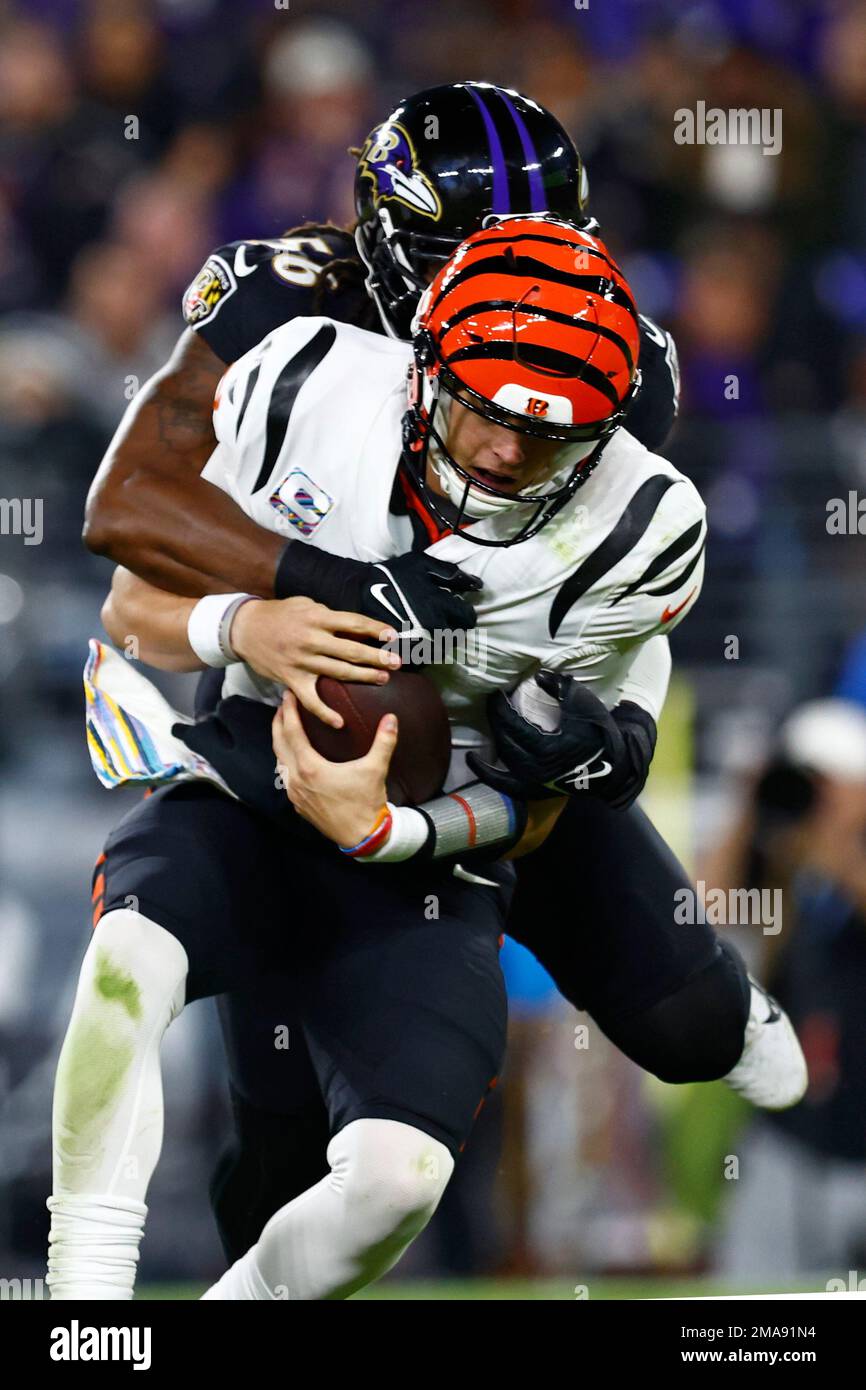 Cincinnati Bengals Quarterback Joe Burrow (9) Is Sacked By Baltimore ...