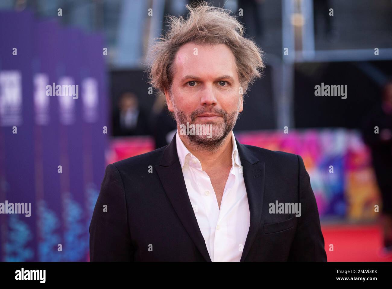 Florian Zeller poses for photographers upon arrival for the premiere of