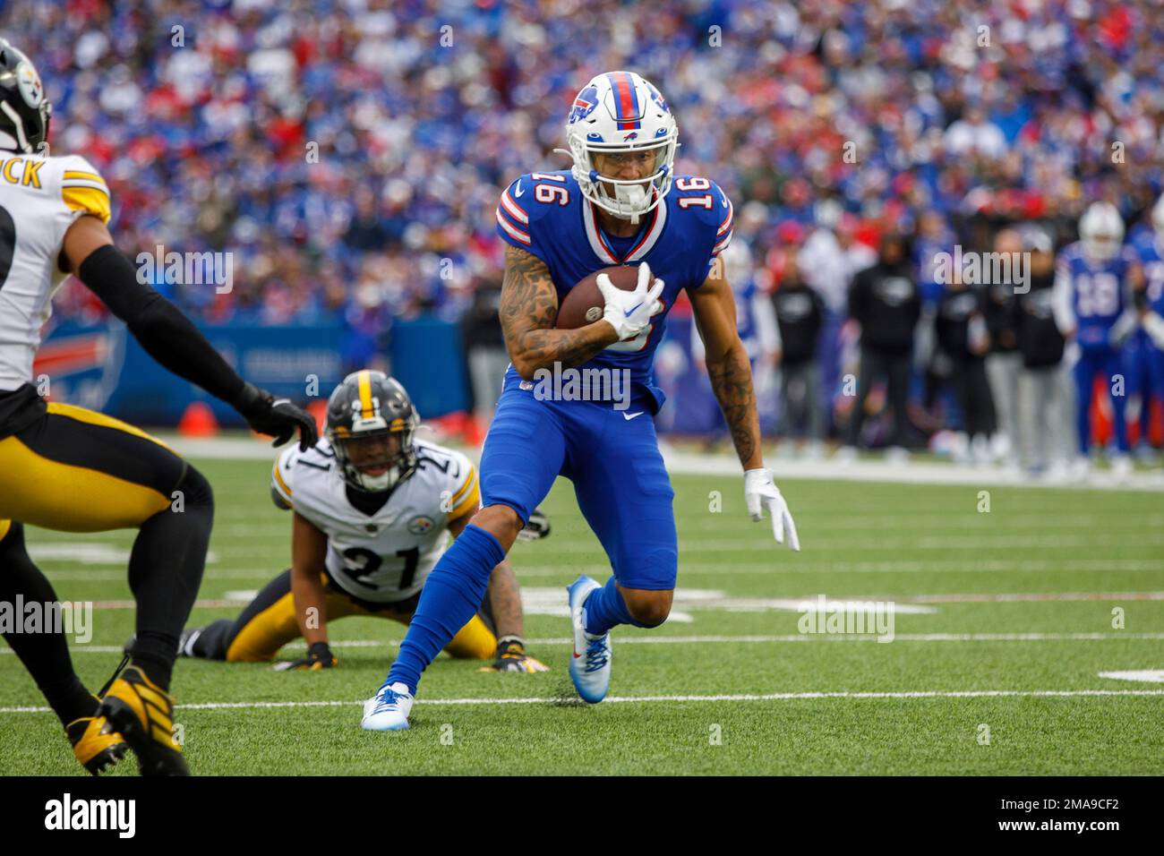Buffalo Bills wide receiver Isaiah Hodgins (16) runs after a catch