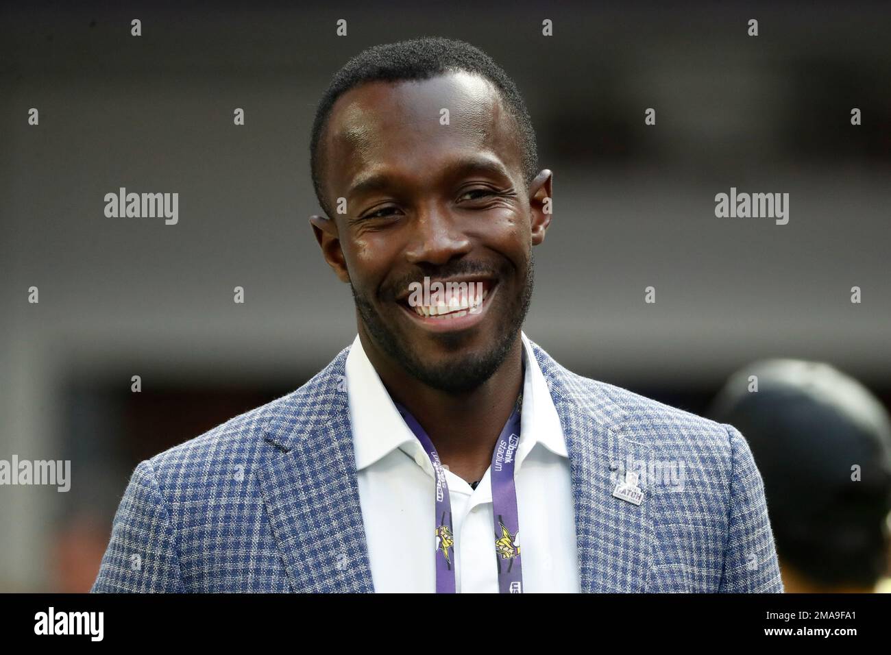 Minnesota Vikings general manager Kwesi Adofo Mensah walks off the field  before an NFL football game between the Miami Dolphins and Minnesota Vikings,  Sunday, Oct. 16, 2022, in Miami Gardens, Fla. (AP