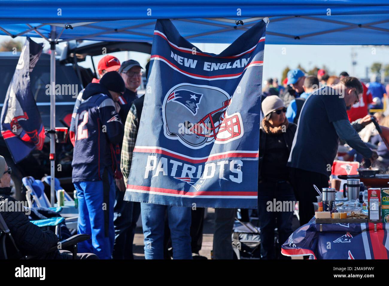 New England Patriots fans tailgate prior to an NFL football game