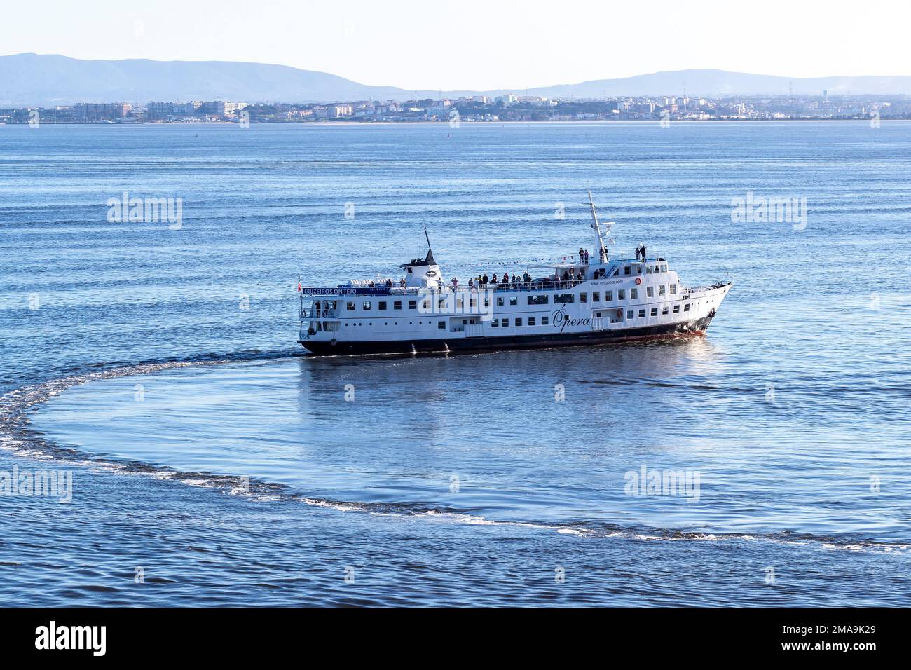 Ferry just leaving the harbour, Lisbon, Portugal. Stock Photo