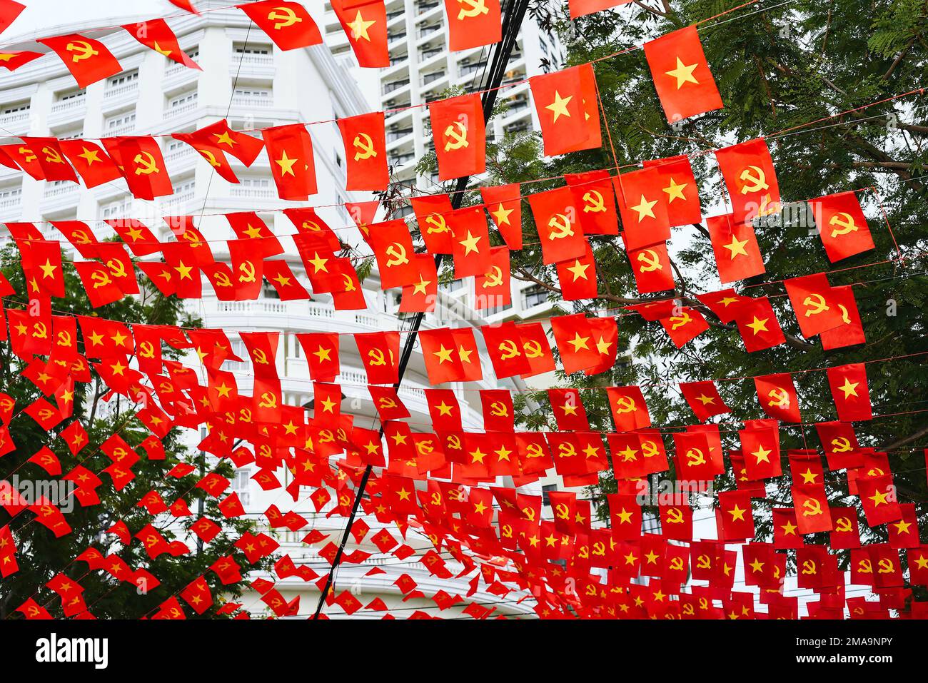 Vietnamese flags and communism flags in Nha Trang Vietnam Stock Photo