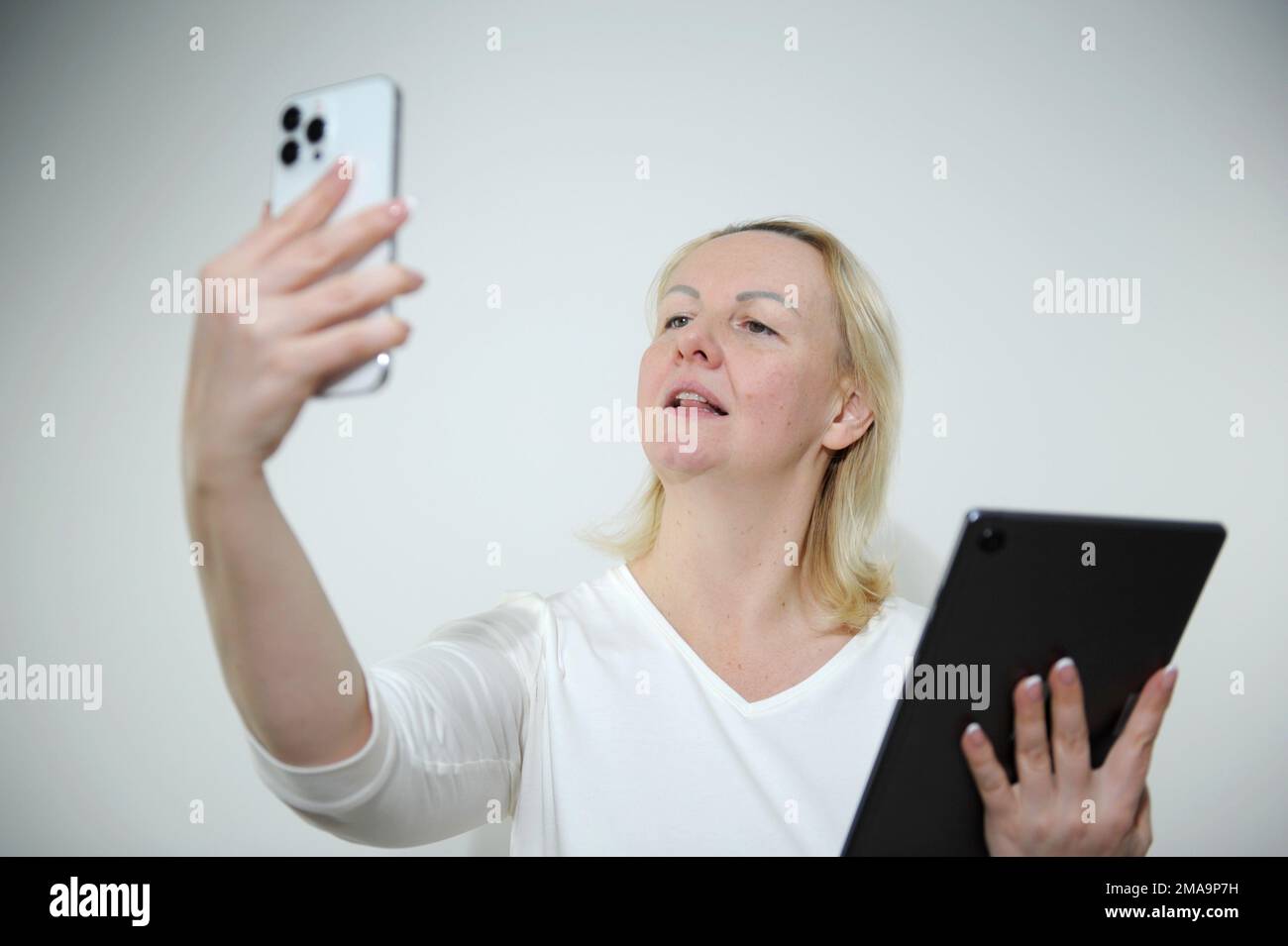 Love to computer concept. Attractive female half-length front portrait ...