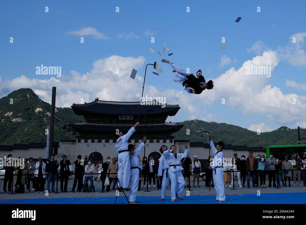 Members of Taekwondo demonstration team break plates during the