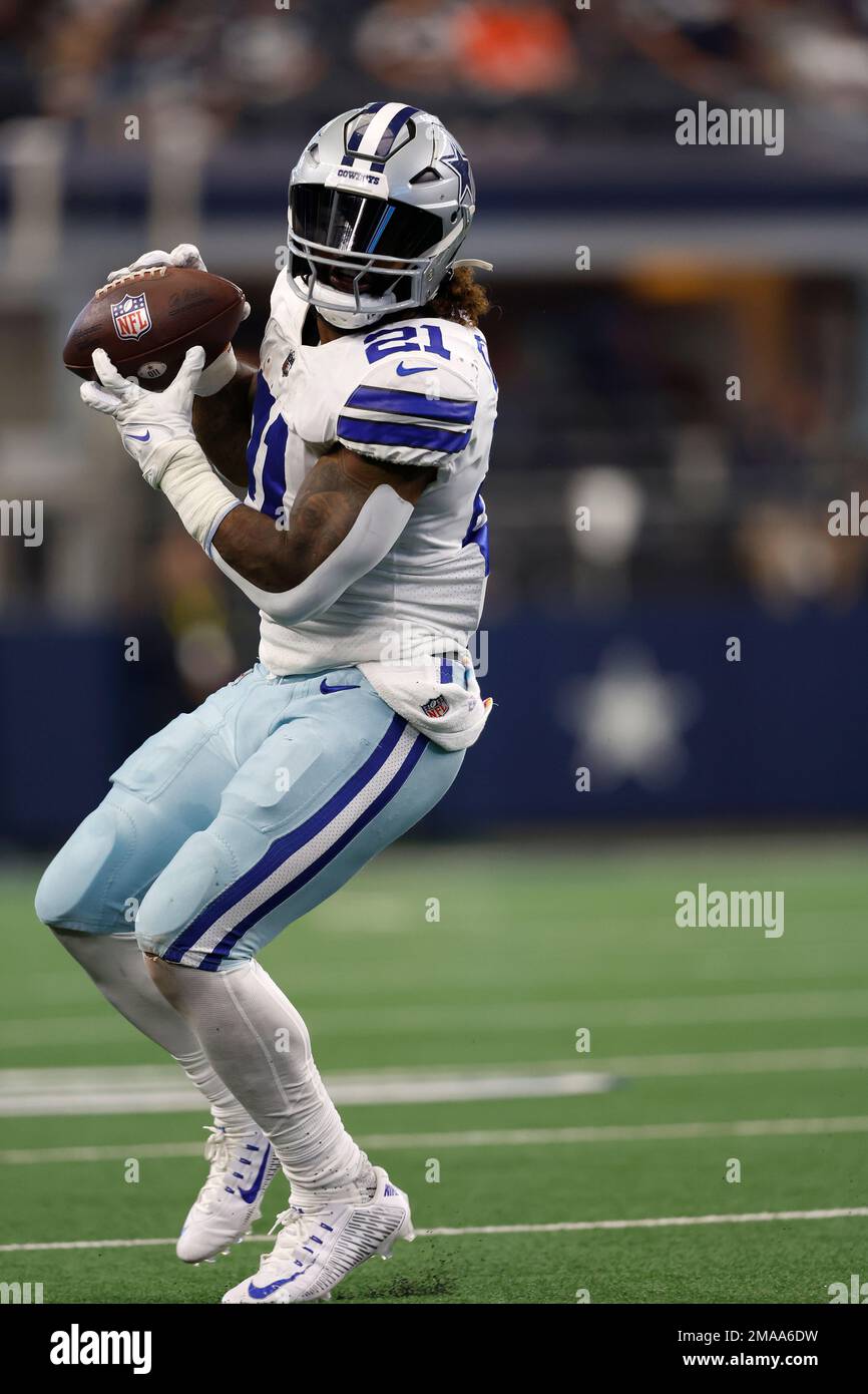 Dallas Cowboys running back Ezekiel Elliott (21) makes a reception during an NFL football game against the Washington Commanders, Sunday, Oct. 2, 2022, in Arlington. (AP Photo/Tyler Kaufman) Stock Photo