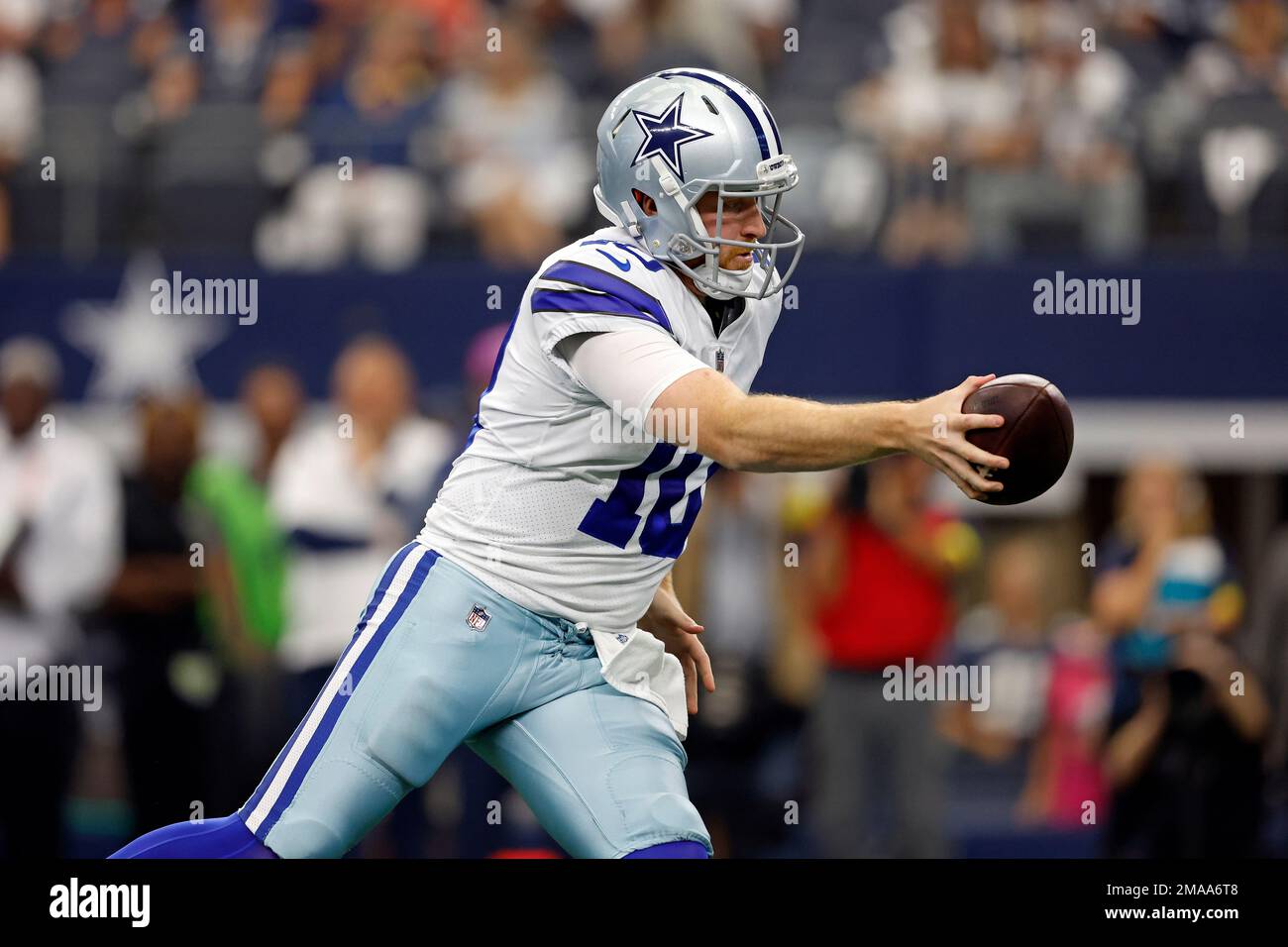 Dallas Cowboys quarterback Cooper Rush (10) hands the ball off during an  NFL football game against the Washington Commanders, Sunday, Oct. 2, 2022,  in Arlington. (AP Photo/Tyler Kaufman Stock Photo - Alamy