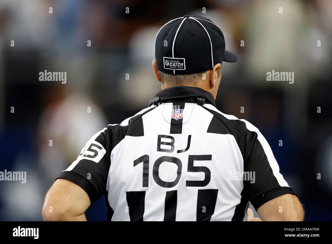 A member of the Dallas Cowboys wears a Crucial Catch hat during an NFL  football game