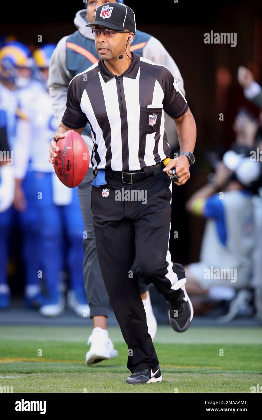 back judge Greg Yette (38) runs onto the field during an NFL football game  between the San Francisco 49ers and the Los Angeles Rams, Monday, Oct. 3,  2022, in Santa Clara, Calif. (