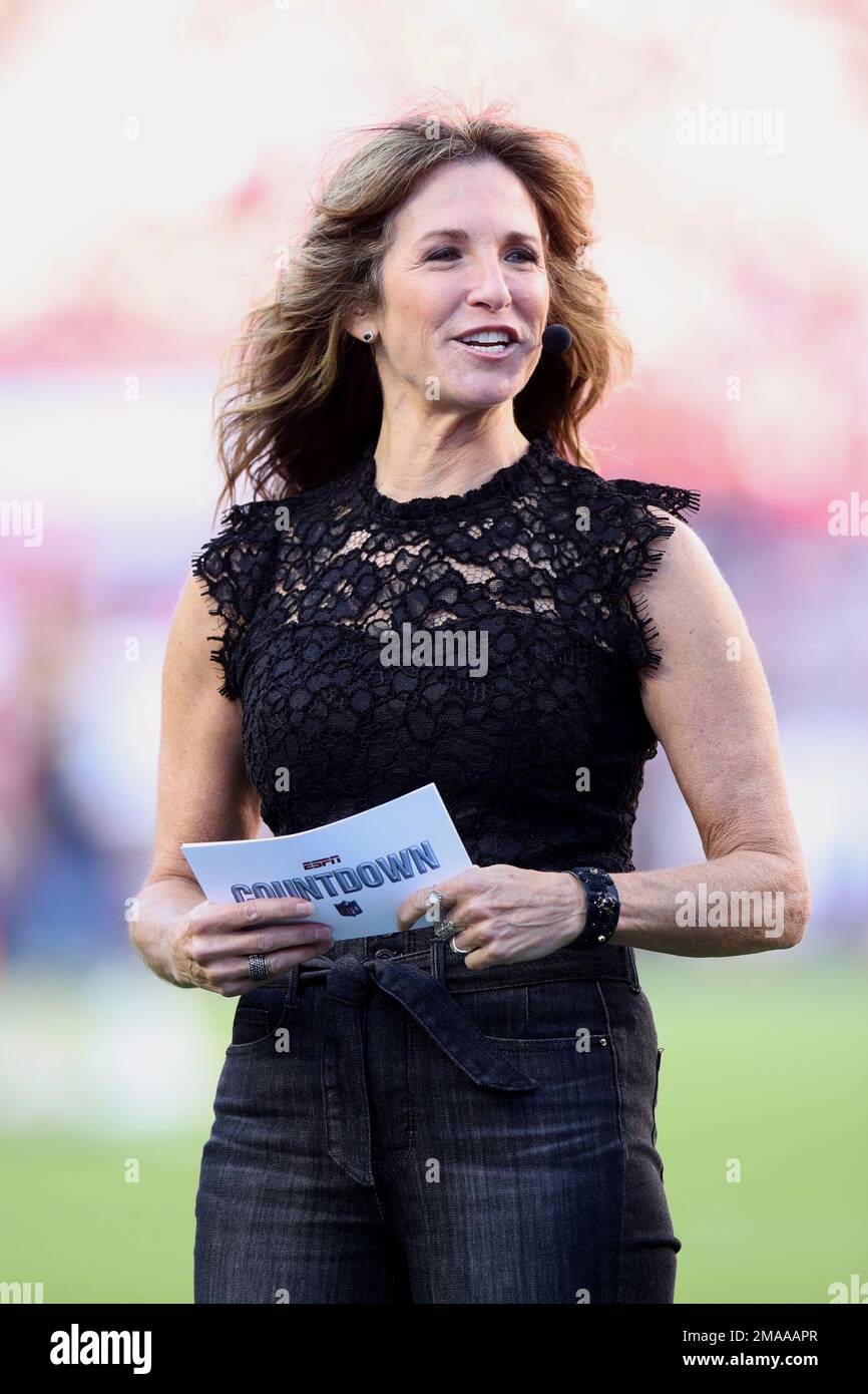 TV Analyst Suzy Kolber reacts before an NFL football game between the
