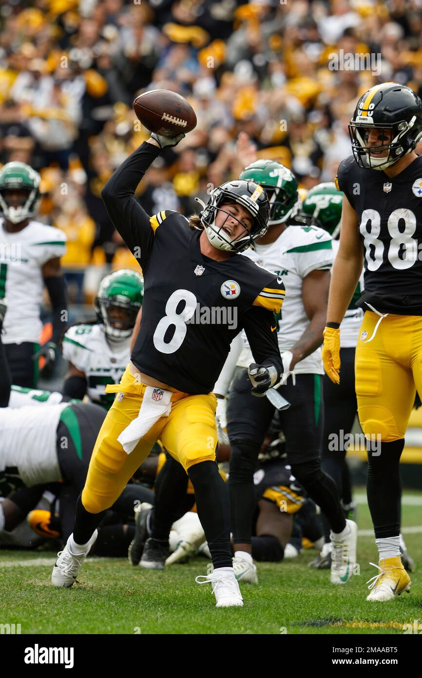 Pittsburgh Steelers quarterback Kenny Pickett spikes the ball after