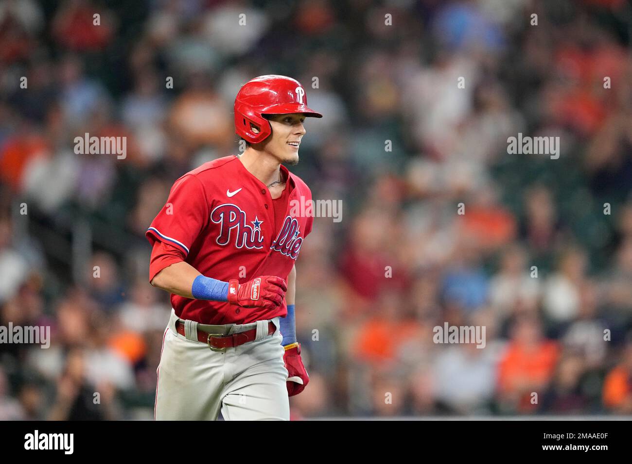 Philadelphia Phillies' Nick Maton smiles as he runs up the first bae line  after hitting a single against his brother, Houston Astros relief pitcher  Phil Maton, during the eighth inning of a