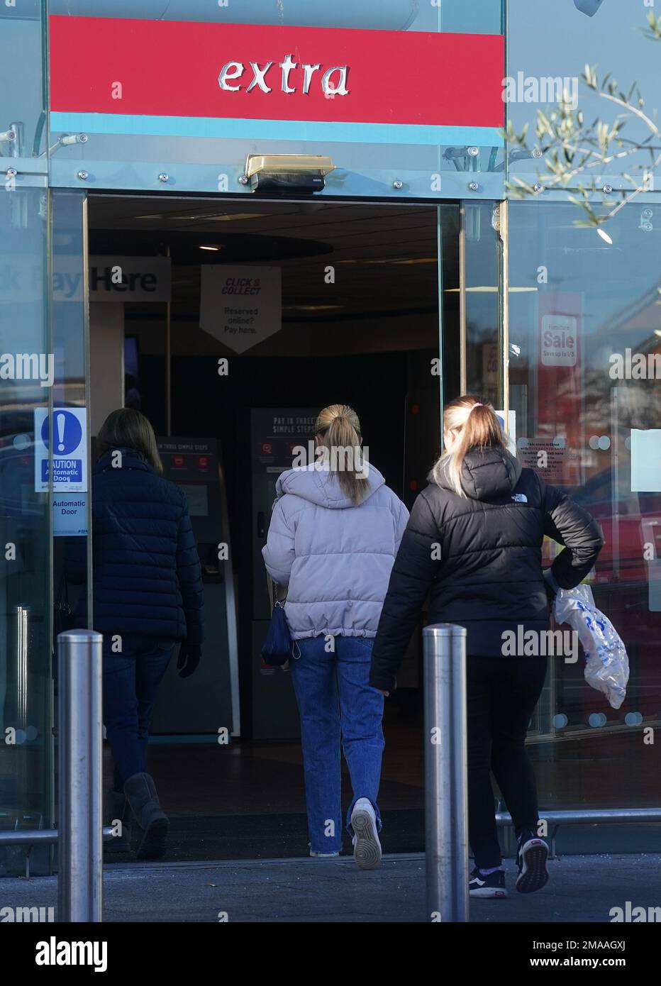 People enter an Argos store in Santry, Dublin. Argos has announced plans to close all its stores