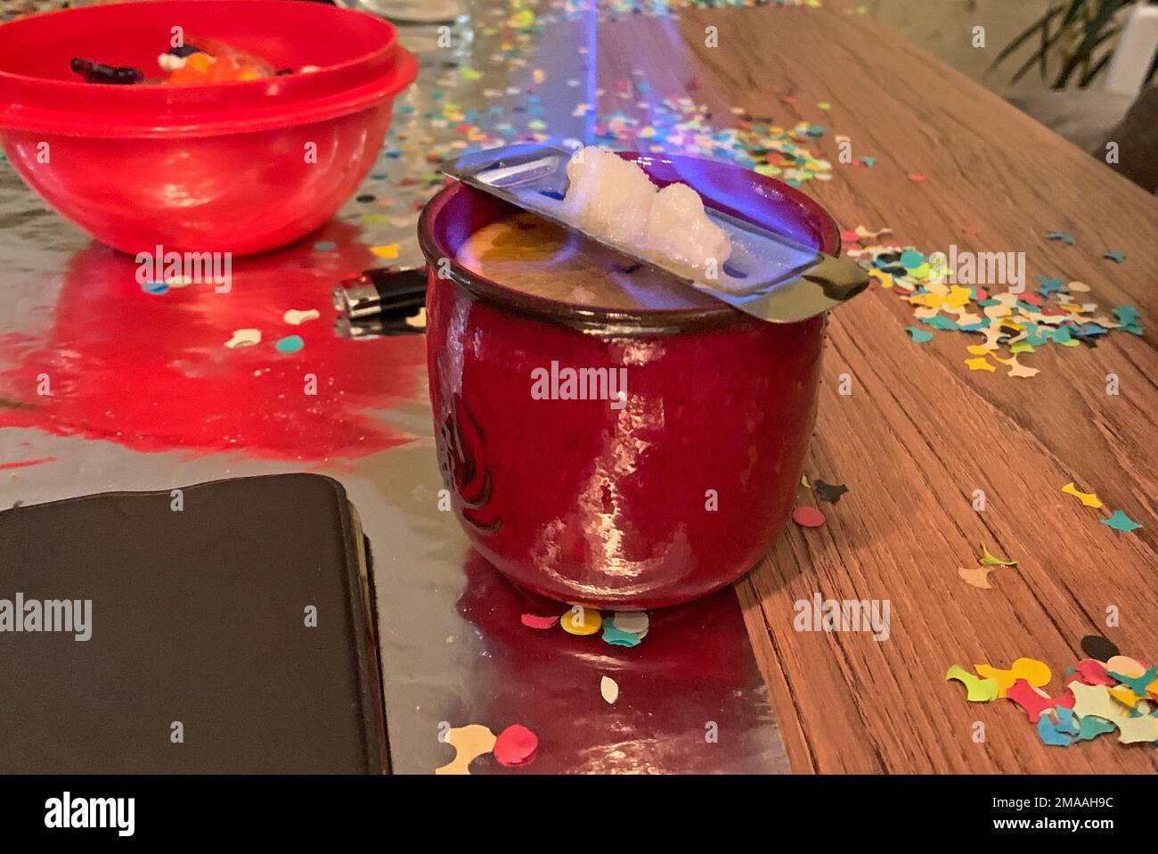 Fire tongs punch drink celebration on a party Stock Photo Alamy