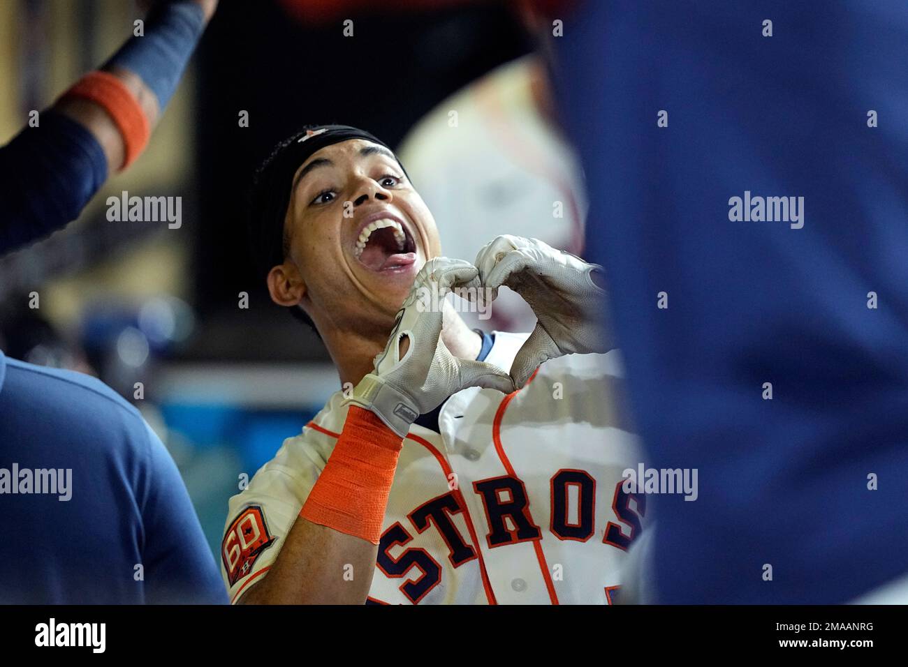 Astros SS Jeremy Pena is pictured smiling at something 2B Jose