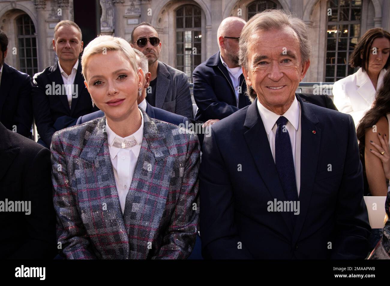 Princess Charlene of Monaco and Bernard Arnault at the Louis Vuitton  Womenswear Spring/Summer 2023 show as part of Paris Fashion Week…