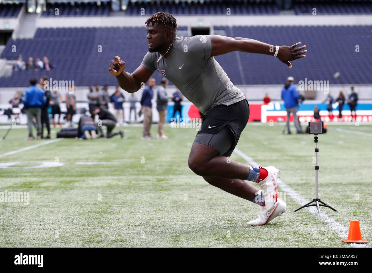 Offensive lineman Basil Chijioke Okoye, of Nigeria, participates in a