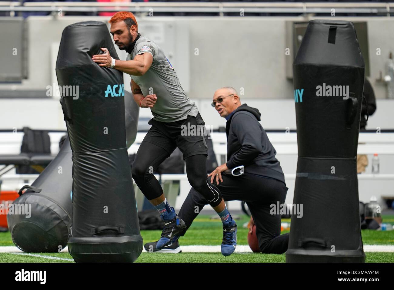 Defensive lineman Jaime Humberto Jiron Bowles, of Panama, runs the 40-yard  dash at the NFL international scouting combine at Tottenham Hotspur Stadium  in London, Tuesday, Oct. 4, 2022. (AP Photo/Steve Luciano Stock