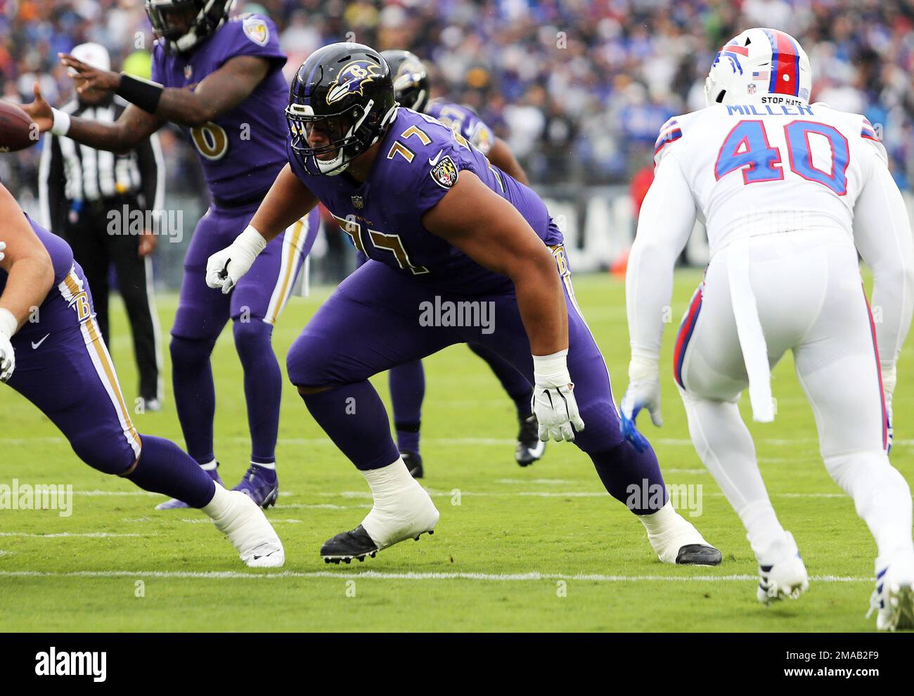 Baltimore Ravens offensive tackle Daniel Faalele plays against the