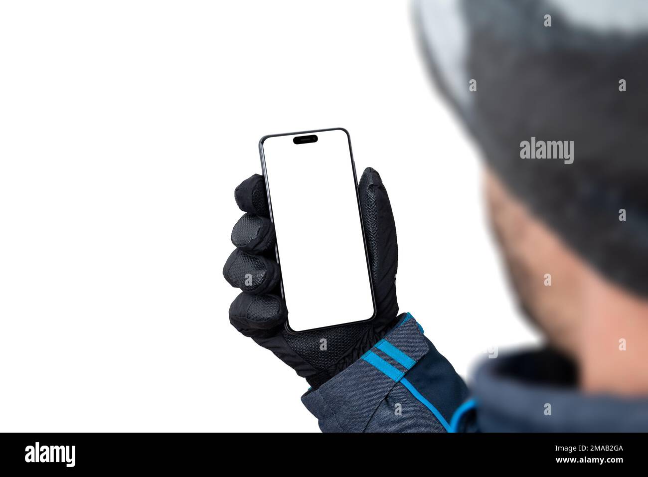 Winter phone mockup in man hand with jacket, gloves and hat. Isolated display and background for app presentation Stock Photo