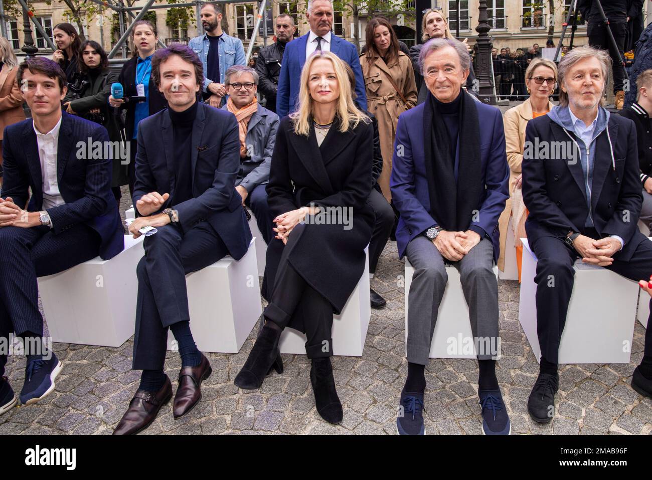 Alexandre Arnault, from left, Antoine Arnault, Delphine Arnault, LVMH CEO  Bernard Arnault and Paul McCartney attend the Stella McCartney  ready-to-wear Spring/Summer 2023 fashion collection presented Monday, Oct.  3, 2022 in Paris. (Photo