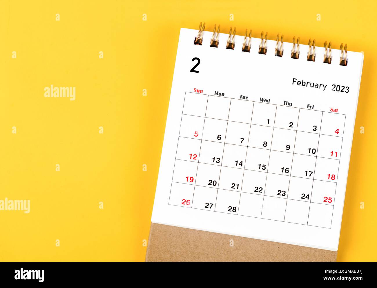 February 2023 Monthly desk calendar for 2023 year on yellow background ...