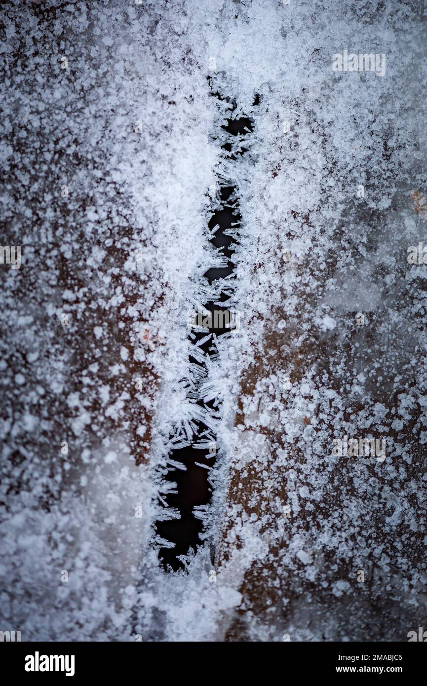 Wooden path covered crystals of ice. Frost on boards. Background ...