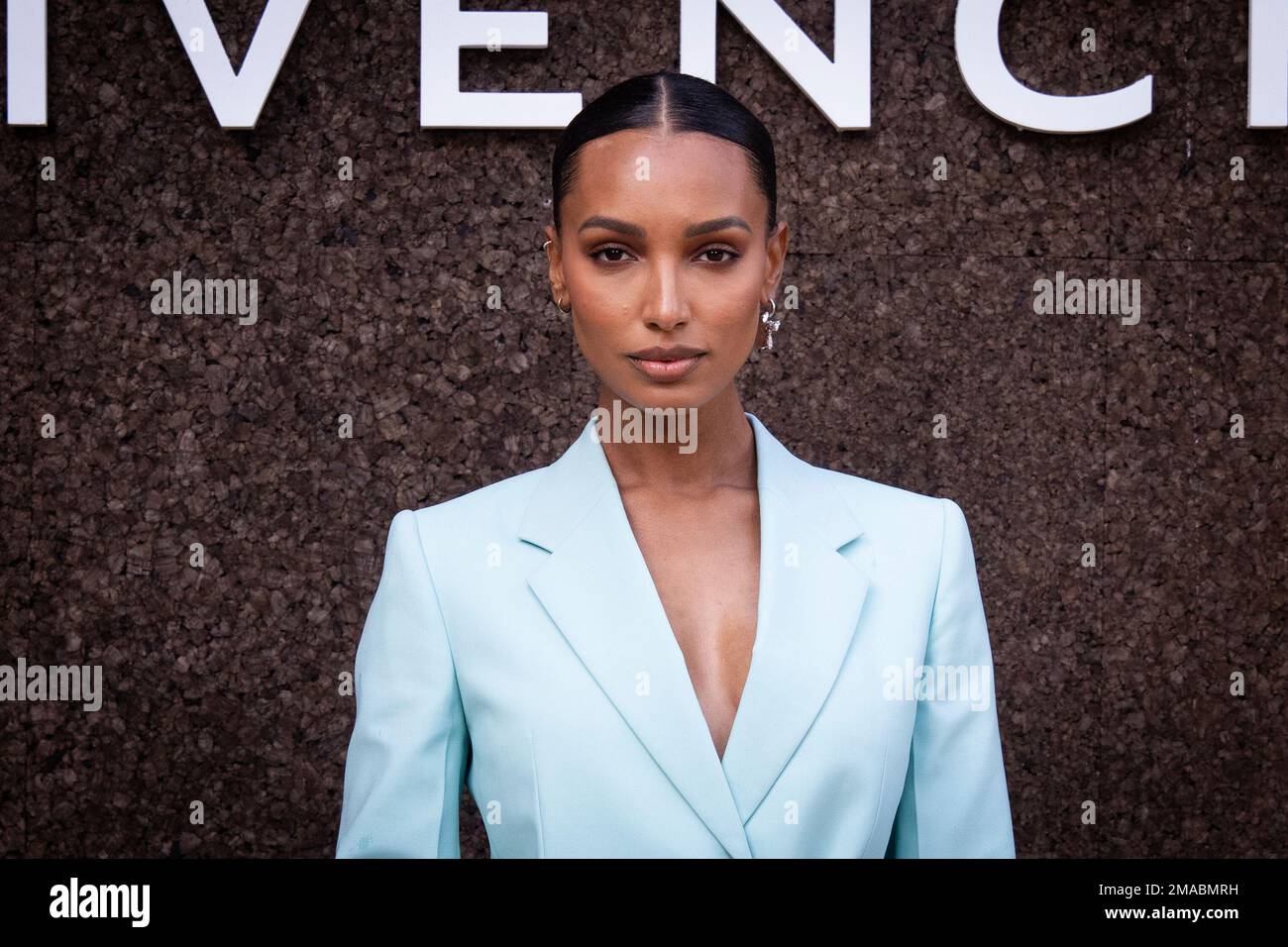 Jasmine Tookes poses for photographers upon arrival for the Givenchy